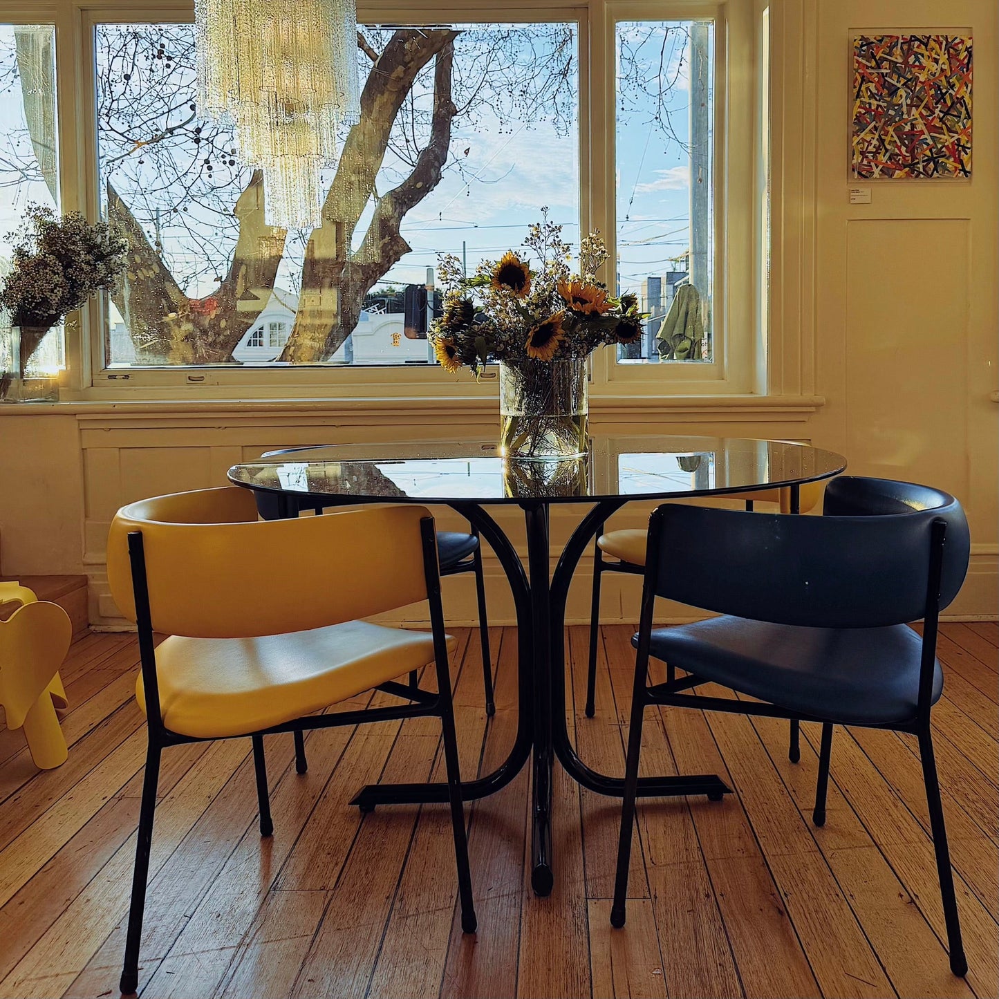 POST MODERN / Tubular Black + Smoke Glass Round Dining Table