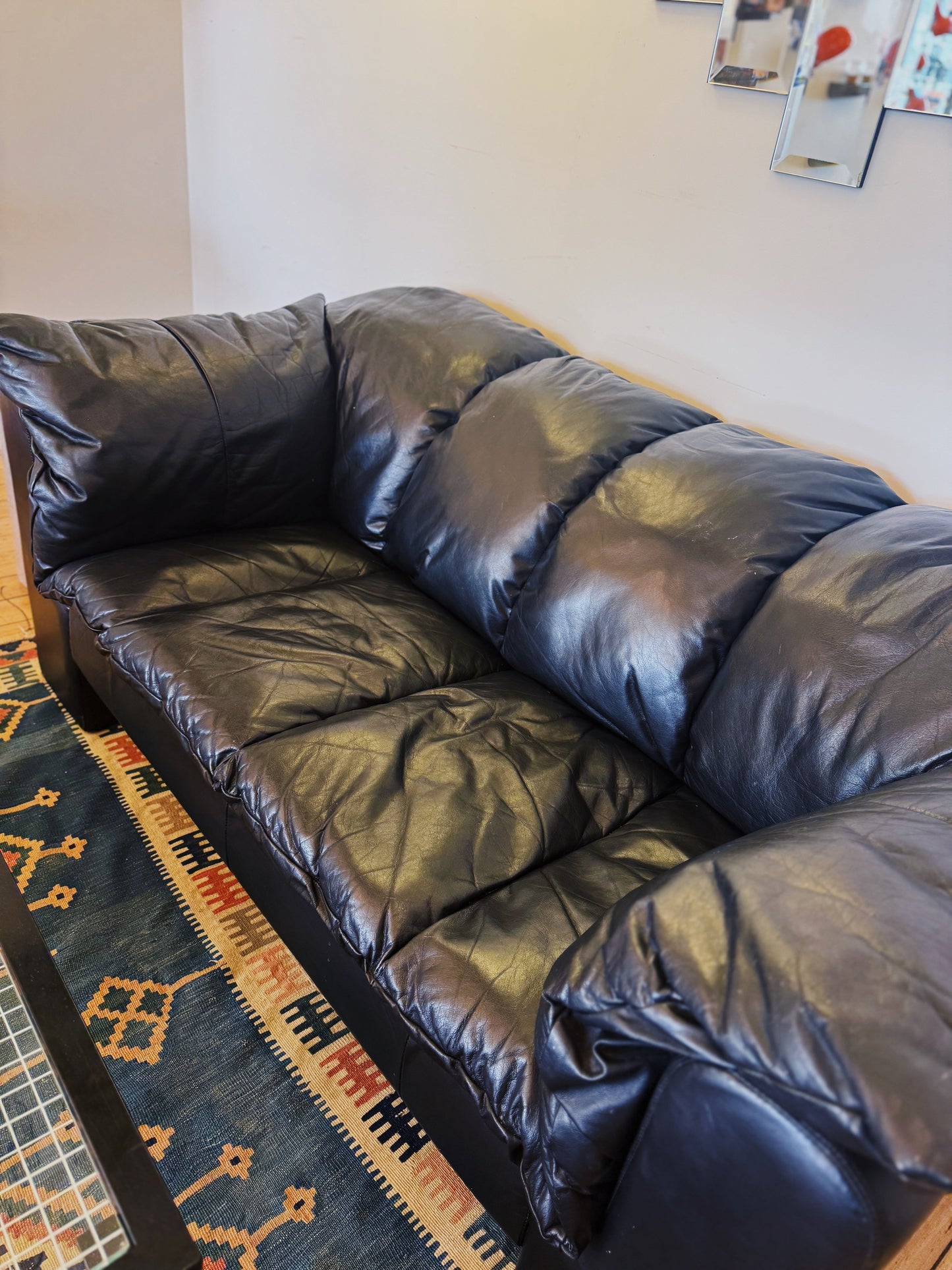 POST MODERN / Black Leather Puffer Sofa