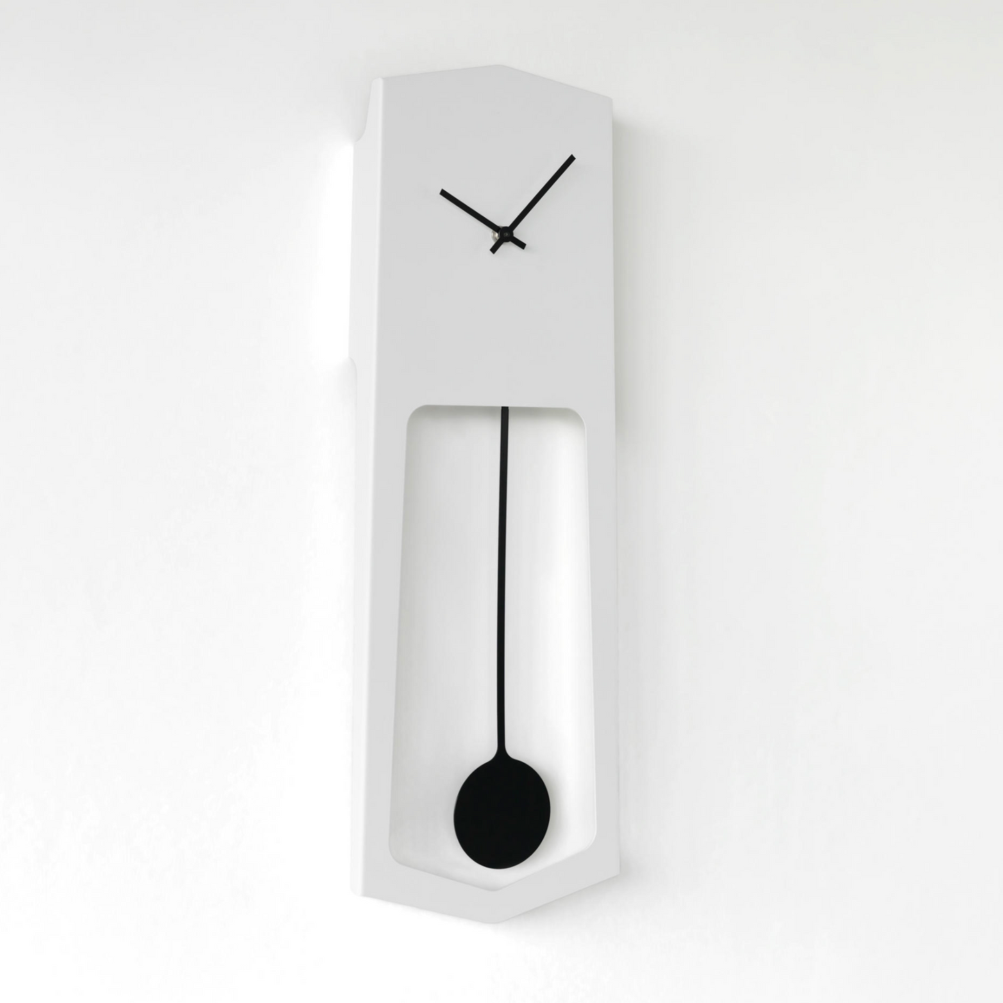 COVO / Aika Wall Clock with Pendulum by Ari Kanevra